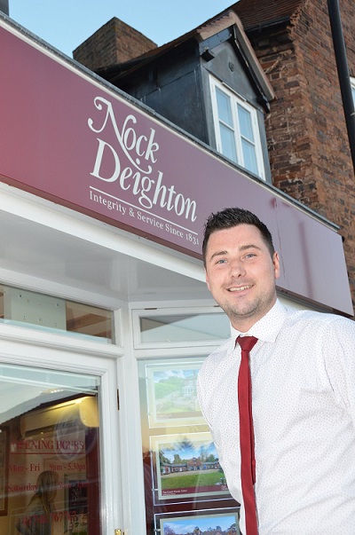 A picture of Andrew Ainge stood outside the Nock Deighton Bridgnorth office